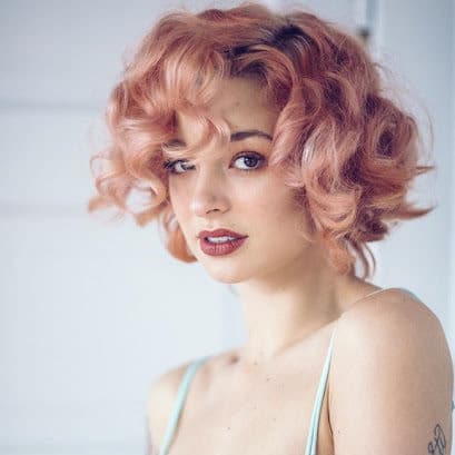 Short curly light pink hairstyles