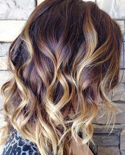 Shoulder length balayage short curly hair