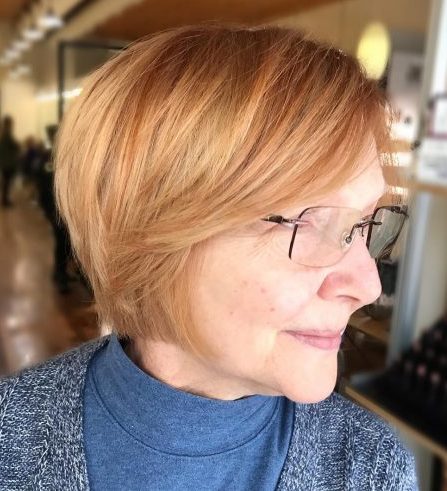 Short hairstyles for over 50 with glasses