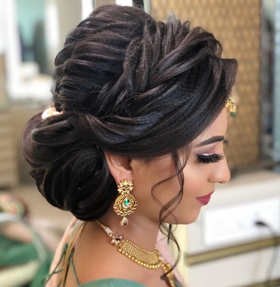 Side bun hairstyle for indian wedding