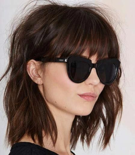 brown shoulder length hair with bangs