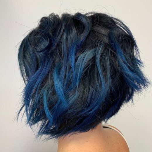 dark blue curly hair
