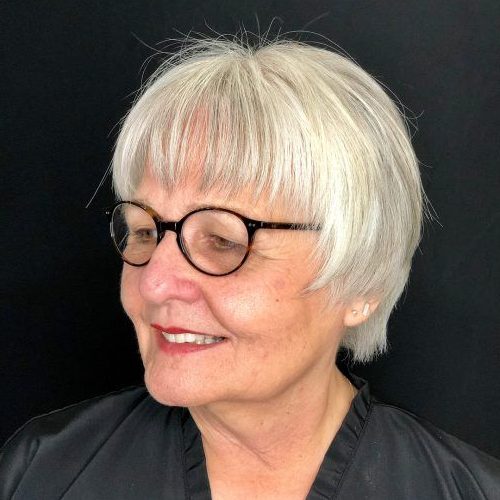 old woman short hairstyles for over 70 with glasses