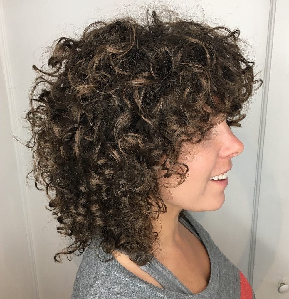 Frizzy hairstyles for naturally curly hair over 50