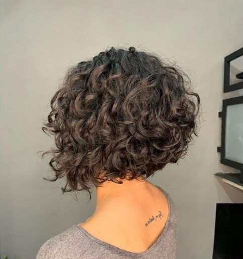 shoulder length layered curly bob