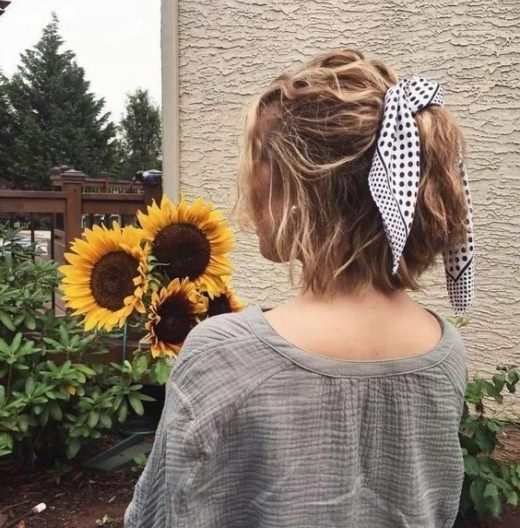 half up half down curly hair with bandana