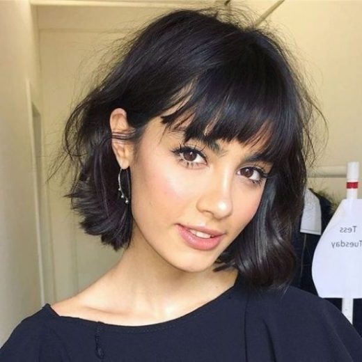 short curly hair with bangs and layers
