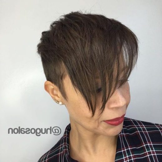 edgy pixie cut with long bangs