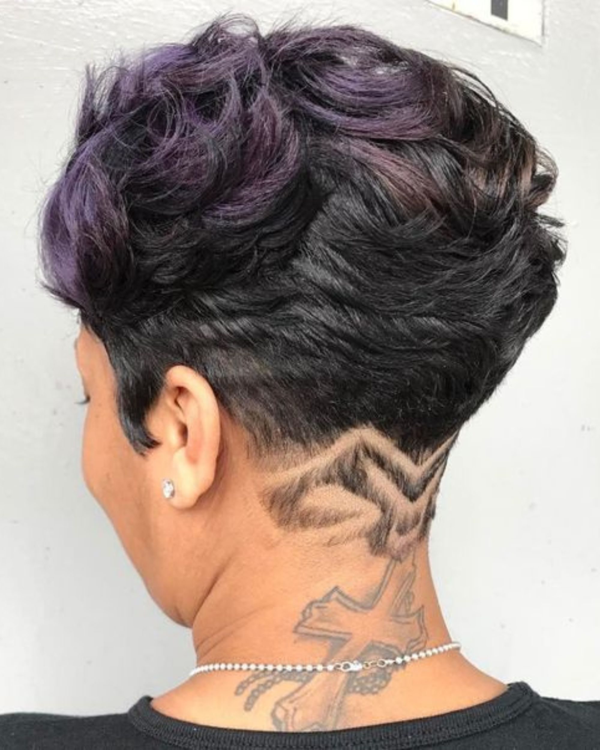 curly pixie cut shaved sides