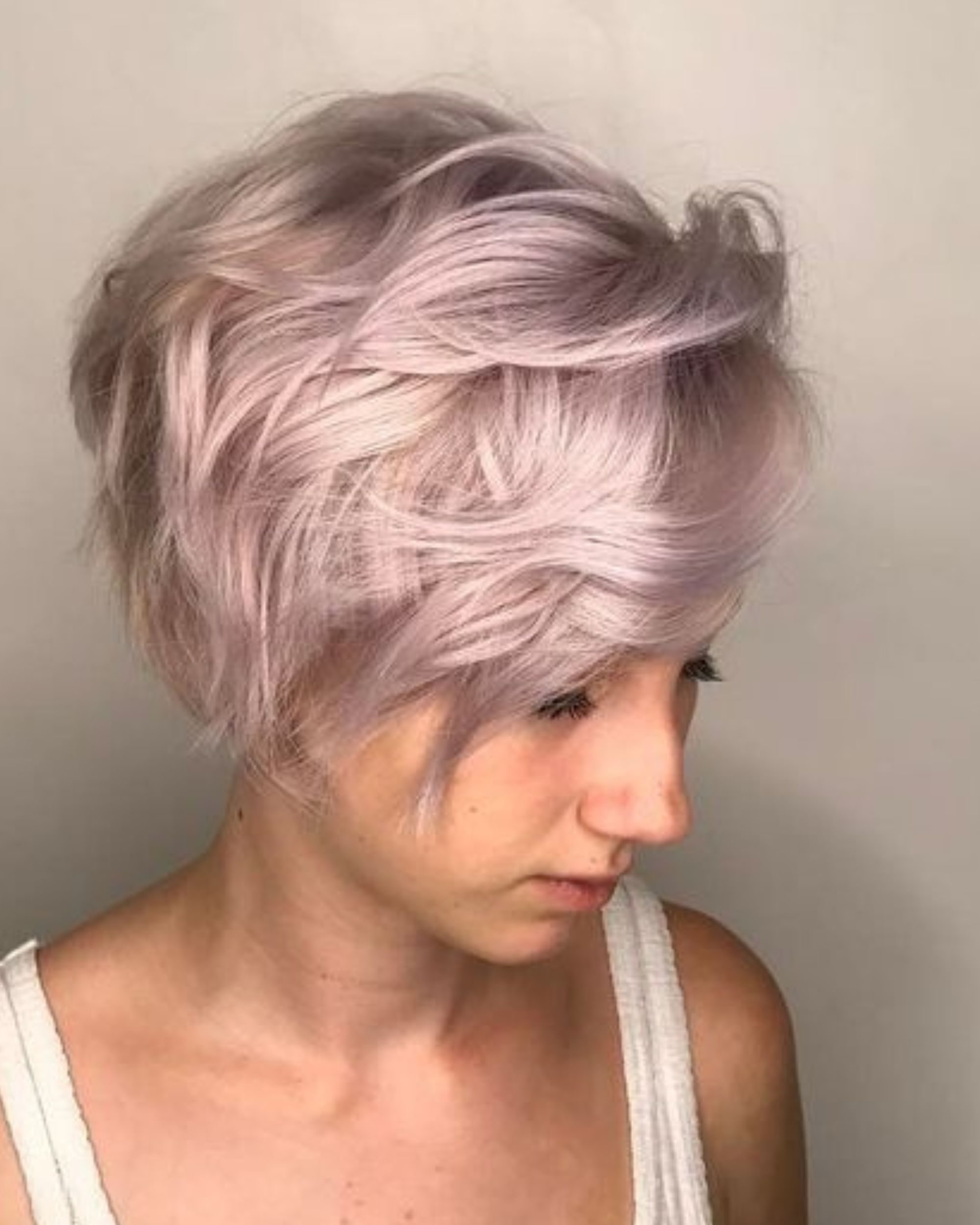 short pastel pink pixie cut