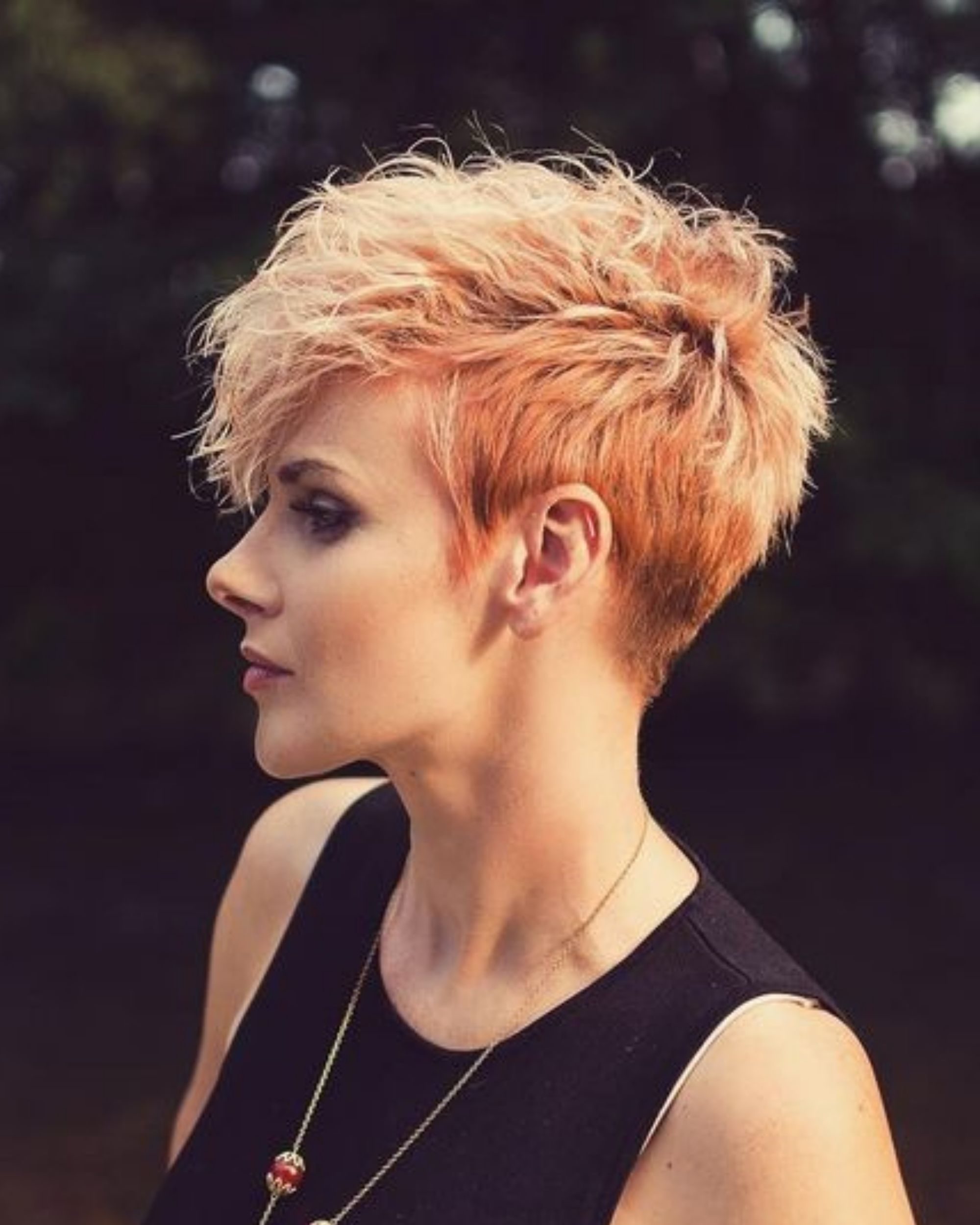 asymmetrical curly pixie cut