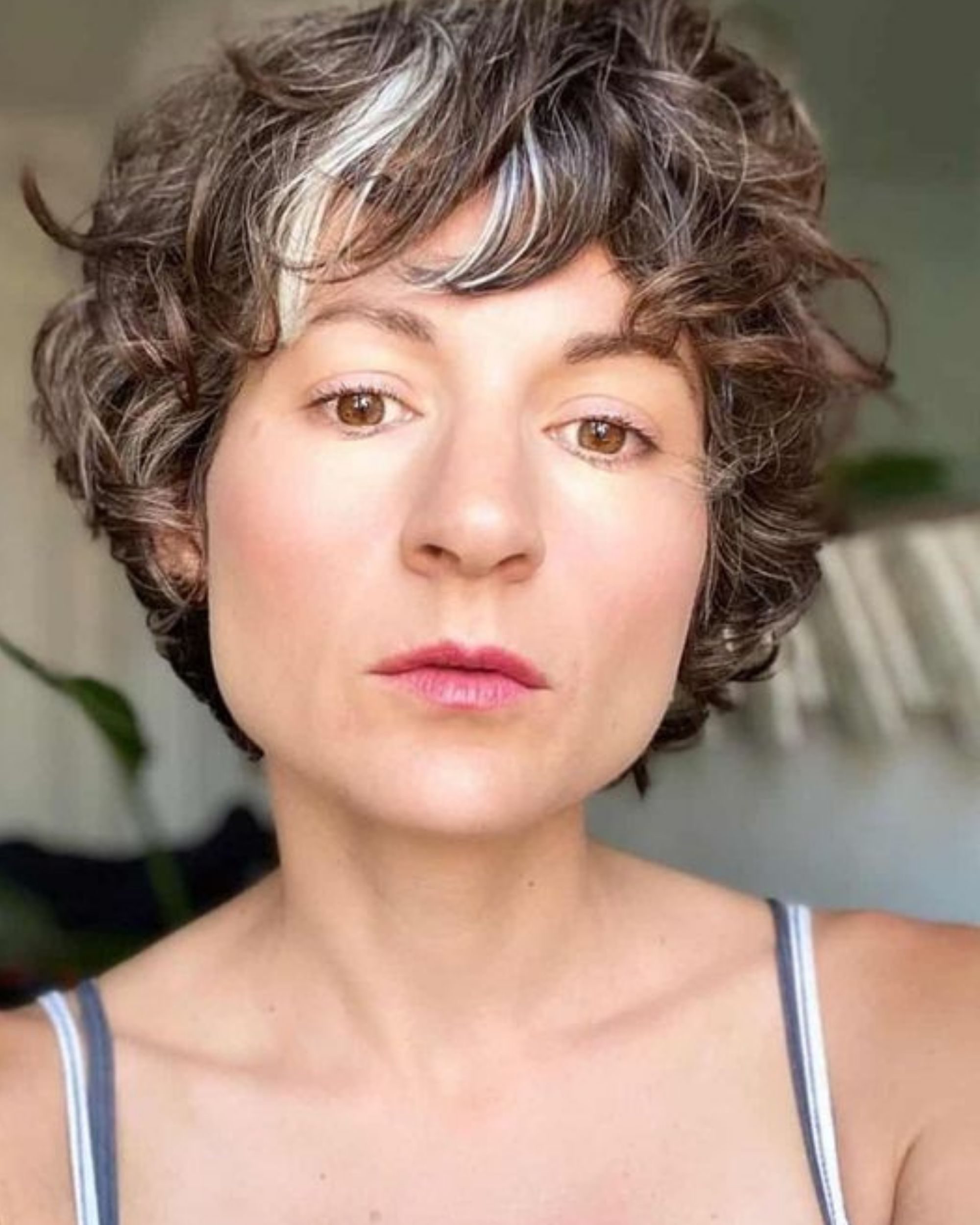 feminine curly pixie cut