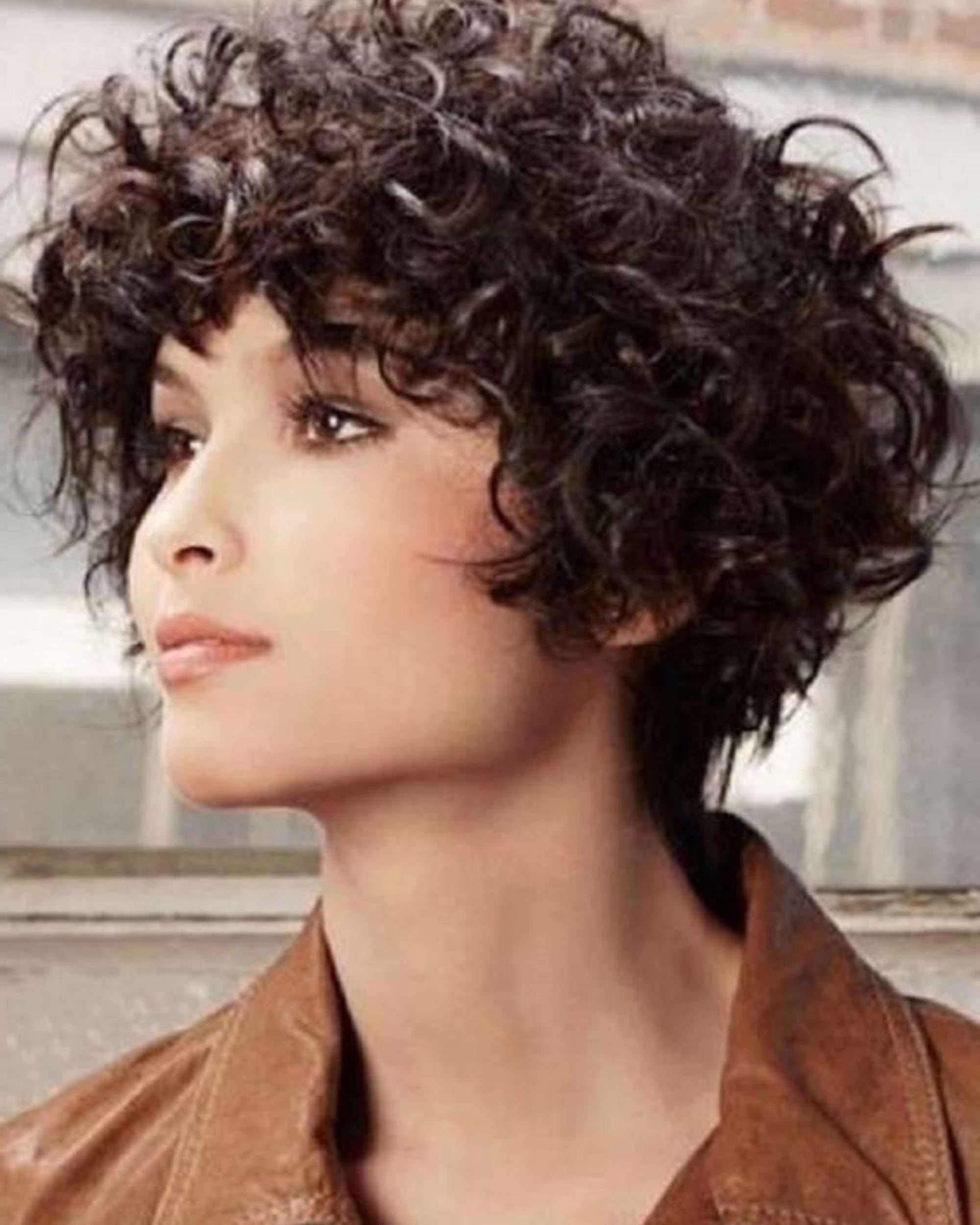 girl with short curly hair
